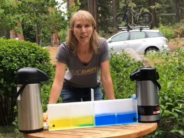 researcher demonstrating water research in Tahoe