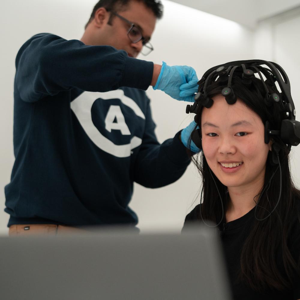 Two people setting up a research study