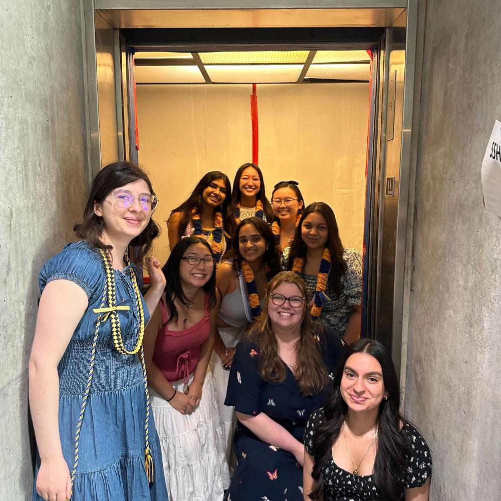 Peer Advisors posing in an elevator