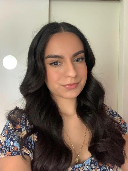 A woman smiling