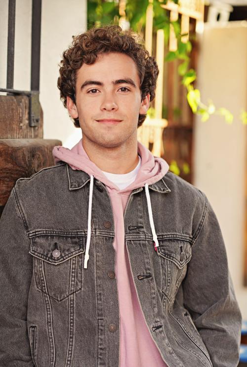 Man in a jacket smiling