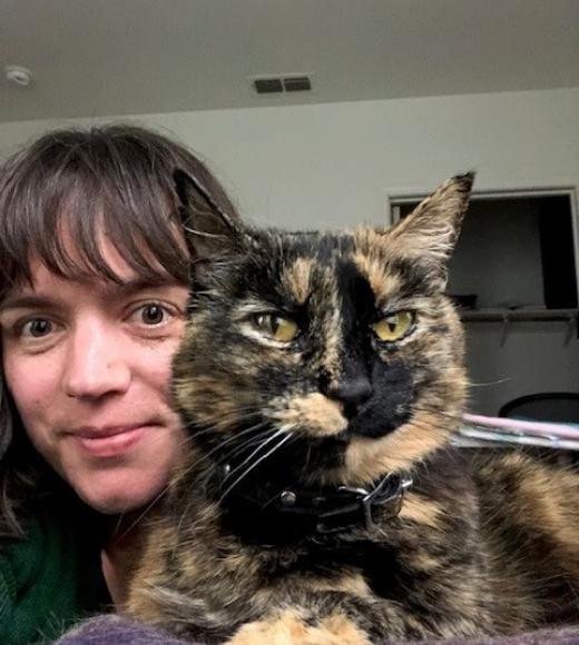 Photo of Laura with her cat